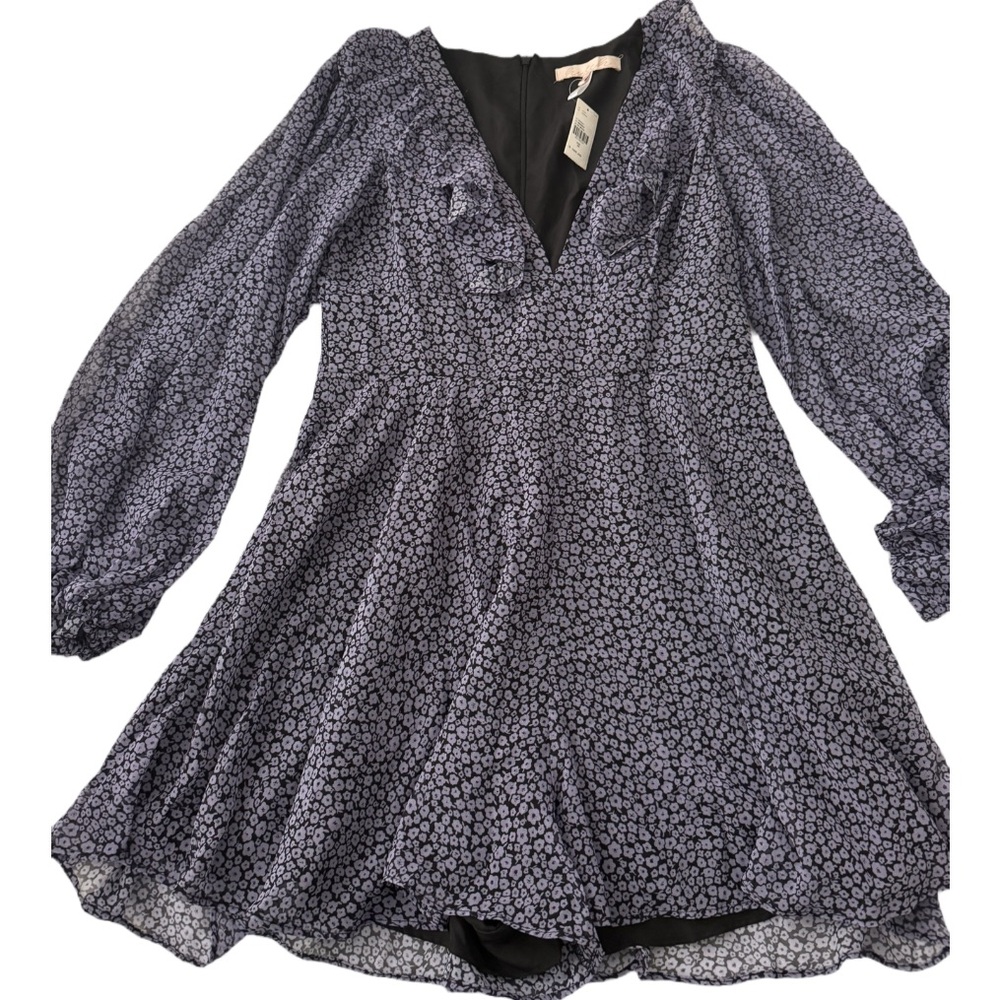 Anthropologie Hutch Deep V printed romper. Pockets! Purple/lilac black. Size M.